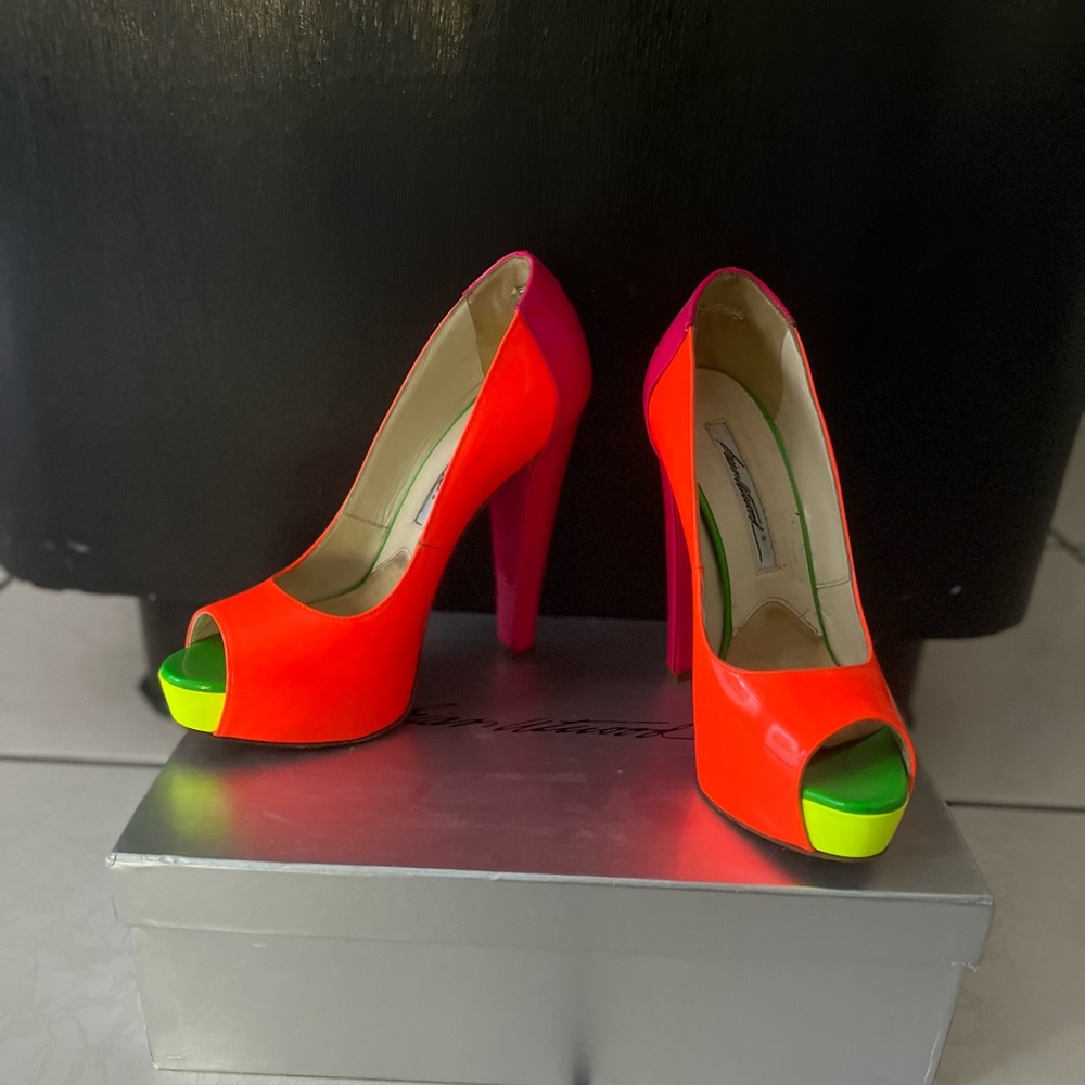 Brian Atwood “Alima” neon peep toe platforms